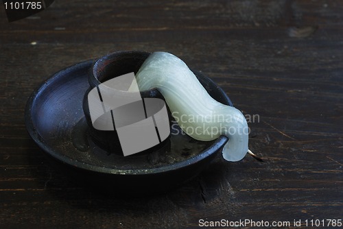 Image of deformed candle-end