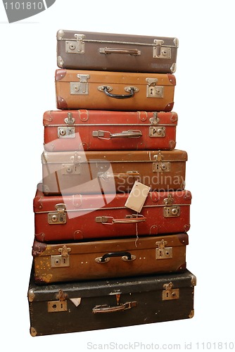 Image of Pile of battered old suitcases