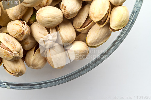 Image of Pistachios nuts in glass bowl