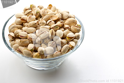 Image of Pistachios nuts in glass bowl