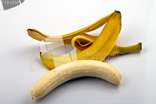 Image of Peeled banana and peel