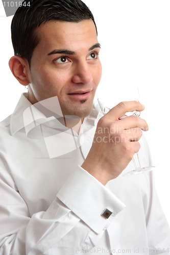 Image of Man with wine looking sideways