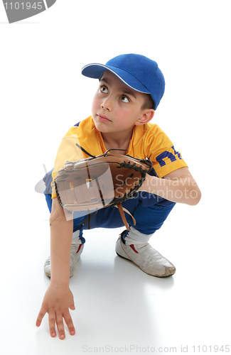 Image of Little boy in baseball T-ball gear