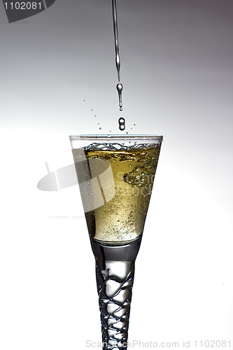 Image of Champagne pouring into glass