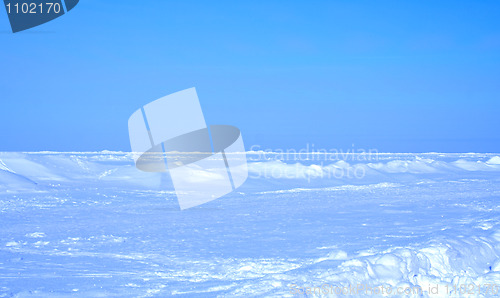 Image of blue sky and frozen sea