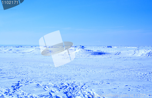 Image of blue sky and frozen sea