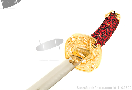 Image of Closeup of golden katana sword 