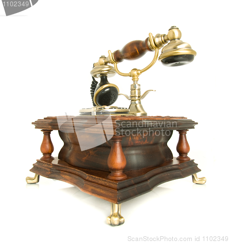 Image of Conversation. Side view of antique telephone