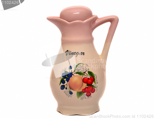 Image of Ceramic bottle of vinegar on a white background