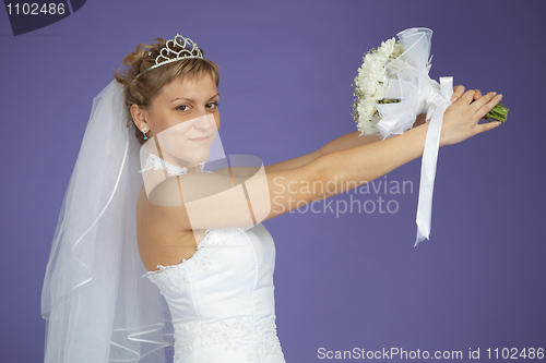 Image of Bride holding wedding bouquet