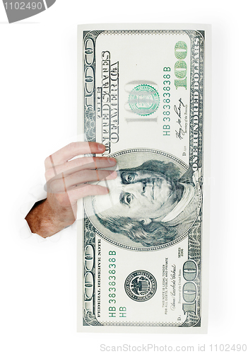 Image of Hand holds huge dollar isolated on white