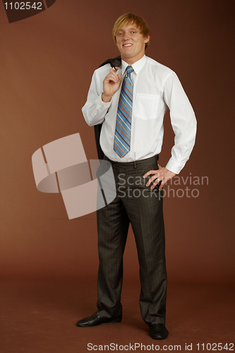 Image of Young man on brown background