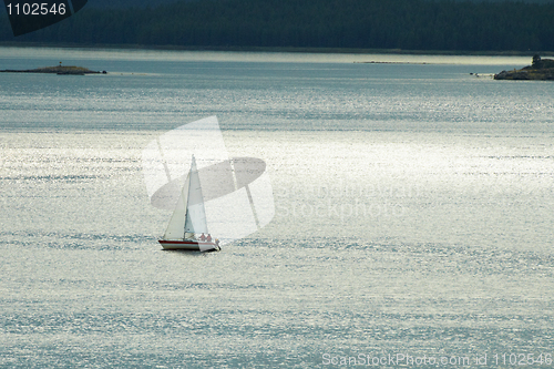Image of Small lonely yacht against sea
