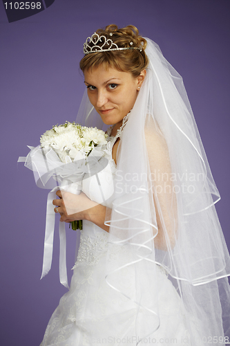 Image of Portrait of bride with bouquet