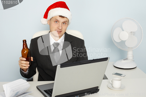 Image of Businessman meets new year still working