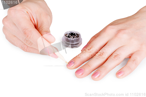 Image of Gluing crystals on nails