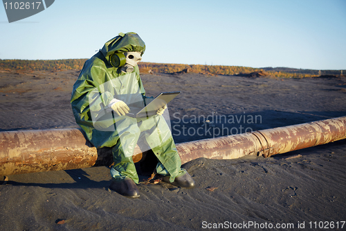 Image of Environmental scientist in ecological disaster zone