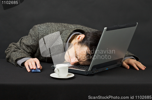Image of Guy worked at night in Internet has fallen asleep