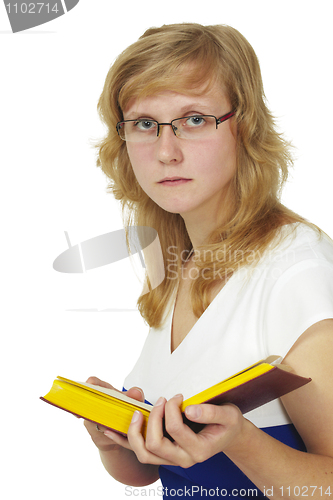 Image of Woman wearing spectacles reads book