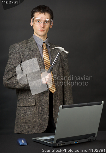 Image of Man repair computer with their own hands
