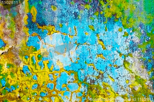 Image of Dirty multicolor peeling wall