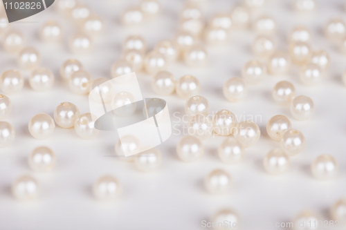 Image of Scattering of fake pearls