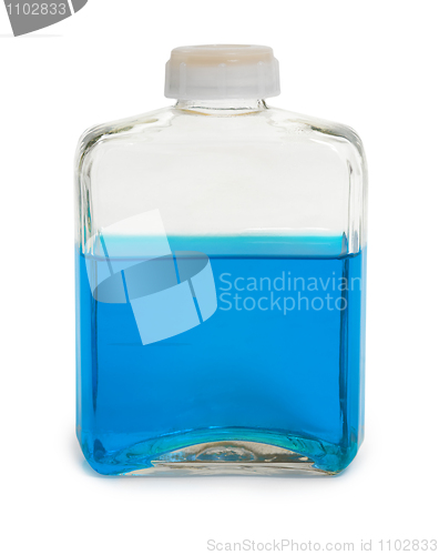 Image of Bottle filled with blue chemical solution