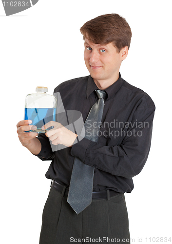 Image of Cheerful man with vial of a blue liquid