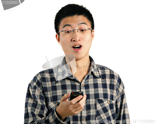 Image of young man surprise by phone