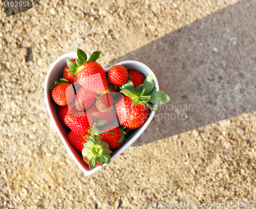 Image of strawberries in heart shape bowl