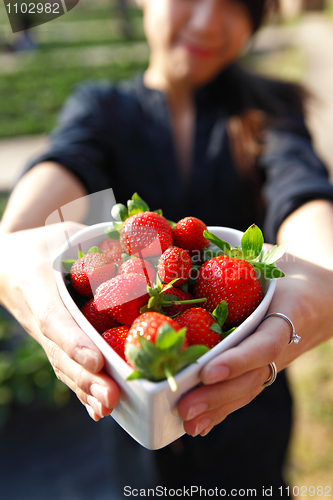 Image of strawberries in heart shape bowl
