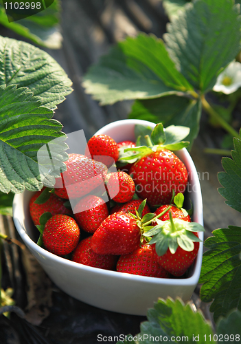 Image of strawberries in heart shape bowl