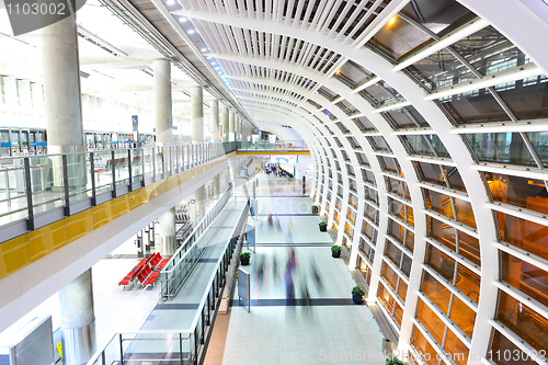 Image of corridor with people moving blur