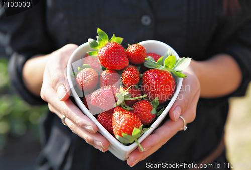 Image of strawberries in heart shape bowl