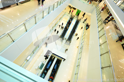 Image of Modern shopping mall. People in rush