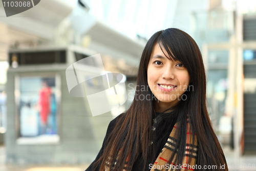 Image of woman in casual wear in city