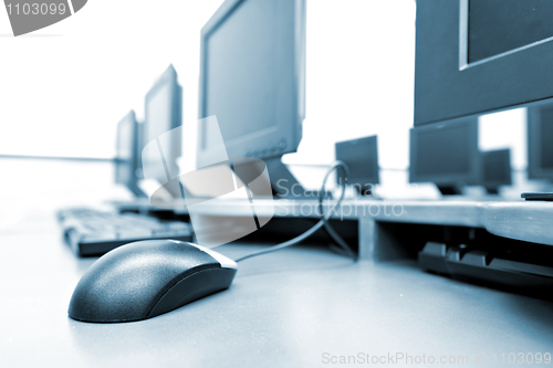 Image of workplace room with computers