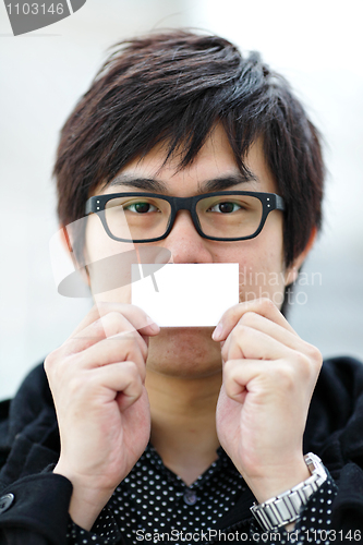 Image of Blank business card with asian man