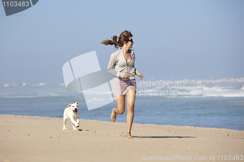 Image of Girl with her cute dog