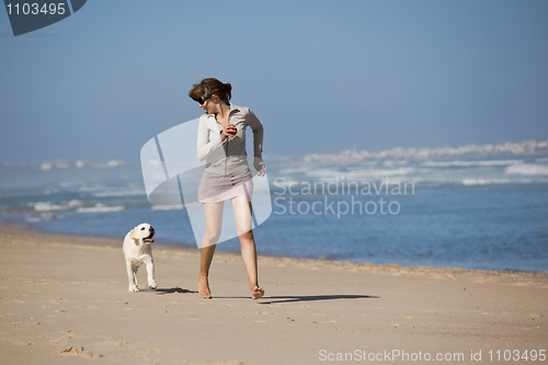 Image of Girl with her cute dog