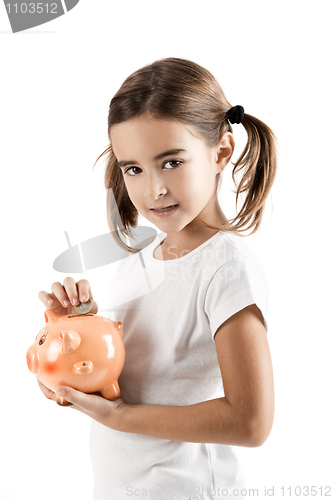 Image of Little girl with a piggy-bank