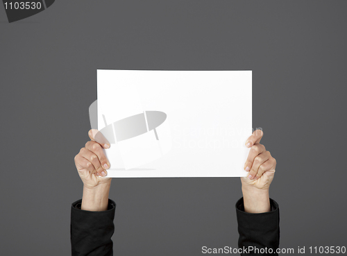 Image of Holding a paper card