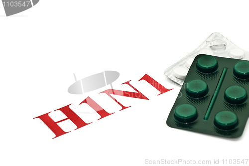 Image of Swine FLU H1N1 - Closeup of green and white pills