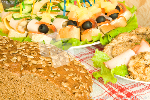 Image of Bread with seeds, meat and canape