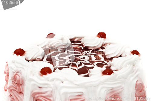 Image of Beautiful dessert - iced cake with cherries 