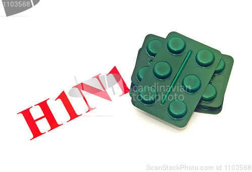 Image of Swine FLU H1N1 - Closeup of green pills 