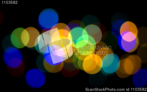 Image of Colorful Blurred lights over black