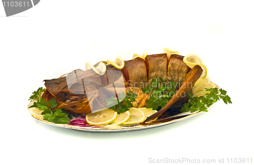 Image of Dinner - bloated fresh-water sheatfish with lemon