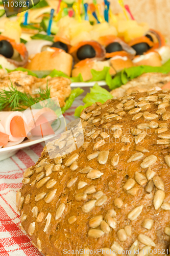 Image of Balyk, chops and bread on table