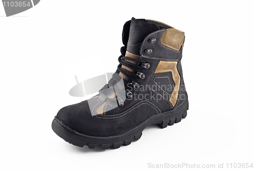 Image of Warm leather boot for wearing in winter or traveling isolated